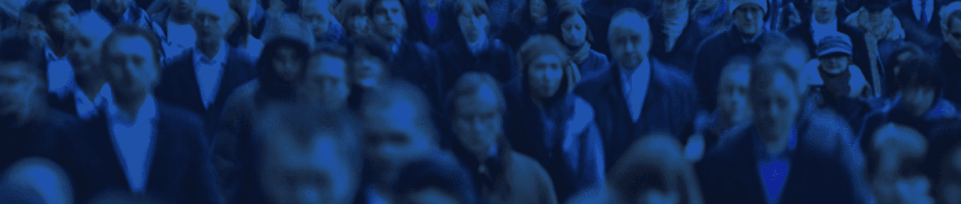 Blurred crowd representing population diversity in medical contexts